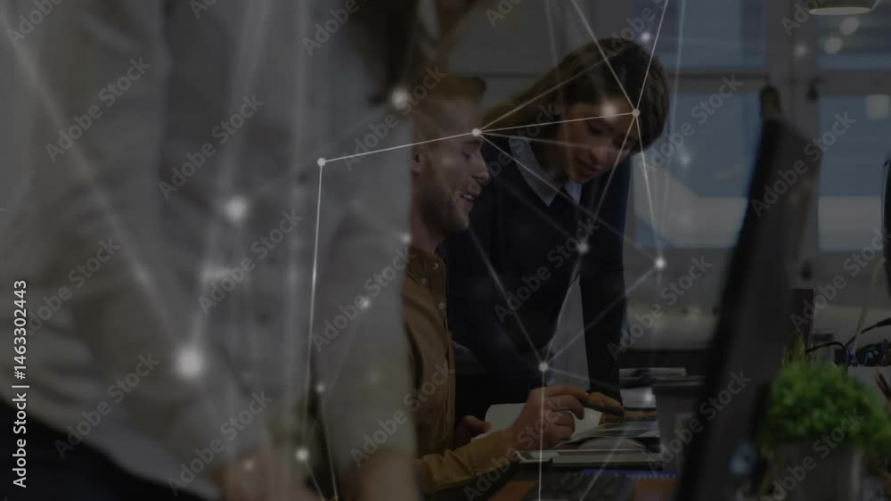 Poster coworkers collaborating at computer desk in tech office, displaying animated network data graphs