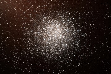 Dense star cluster against a backdrop of countless stars.  A concentrated grouping of many stars, surrounded by a vast expanse of space.  Night sky filled with celestial objects