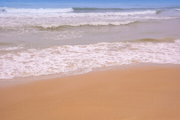 Nature of the beach and sea Summer with sunshine, sandy beaches, clear blue waters sparkling against the blue sky. On an island with good ecology and environment Background for summer vacation