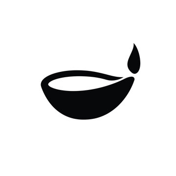 Elegant black and white diya oil lamp symbol of diwali and festive celebration