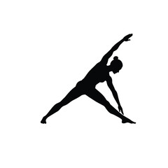 Silhouette of a woman performing a yoga pose balancing in a stretching position