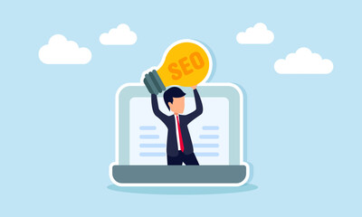 Businessman Emerging from Laptop Holding SEO Lightbulb Representing Keyword Optimization Ideas and Strategies