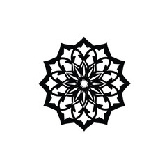 Intricate black and white mandala design with floral and geometric patterns on white background