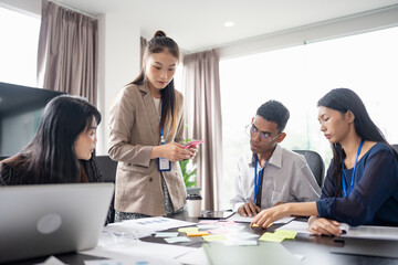 Business asian Multicultural businesspeople working project  working together in office conference ideas in startup at office Diversity leadership and business people