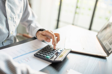 Confident asian business man Auditor or internal revenue service staff checking annual financial...
