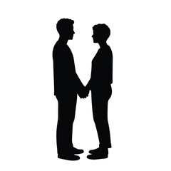 Silhouette of a couple holding hands facing each other in a loving romantic embrace