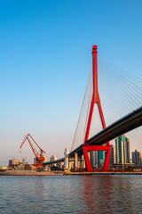 Yangpu Bridge on the Huangpu River in Shanghai, China.