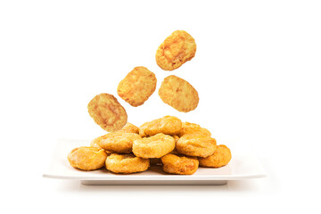 Chicken nuggets on ceramic plate isolated on white background.