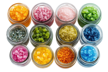Twelve vibrant colored bath salts in glass jars on black background perfect for spa day on transparent background