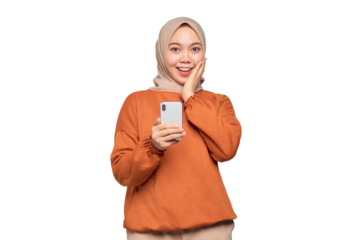 Amazed young Asian woman in orange shirt using mobile phone typing SMS message isolated on transparent background