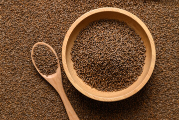 Perilla seed in wooden bowl with spoon, Food ingredient, Top view