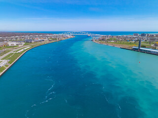 Fototapeta premium Blue Water Bridge is an international bridge across the St. Clair River links Port Huron, Michigan, USA (left) and Point Edward, Ontario, Canada (right). 