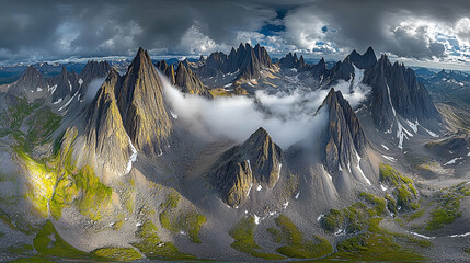 Aerial View of Dramatic Mountain Range with Clouds and Fog