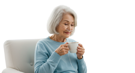 Senior Woman Enjoying Coffee with Nasal Cannula | Elderly Patient Relaxing with Hot Drink in a Chair for Healthcare Marketing and Assisted Living Concepts