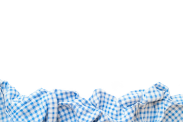 A crumpled blue and white checkered fabric against a stark black