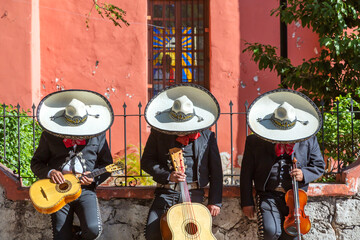 Traditional mexican Mariachi band doing a siesta, Mexico