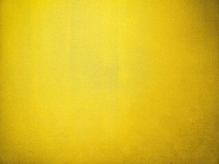 Gold Grunge Paint on Concrete Wall Texture Background.