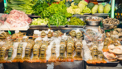 Seafood restaurant on street food street in Yaowarat, Thailand, street food business concept