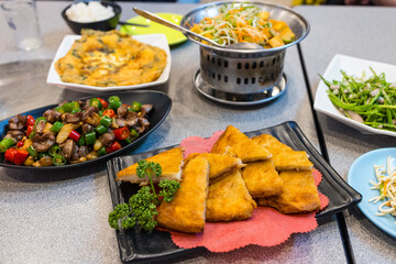 Popular Taiwanese stir-fry dishes on dining table