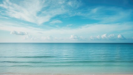 Fototapeta premium Beach Scene Featuring Sky, Ocean, and Cloudy Abstract Background for Wallpaper