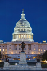 The illuminated United States Capitol in Washington DC during blue hour