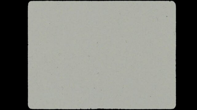 Old 35mm Film Grain Vintage Overscan Frame Matte Seamless 4K Video Background Overlay Effect Loop