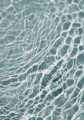 Fototapeta premium Abstract Pale Blue Water Surface Texture with Sunlight Reflections