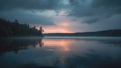 Beautiful evening scene with colorful sky, water reflection, and surrounding nature at sunset