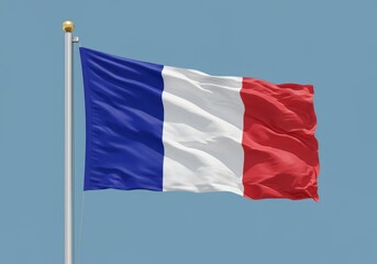 French flag waving gently against a clear blue sky on a sunny day, showcasing its vibrant colors and patriotic symbol
