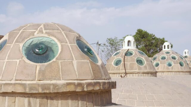 Domes with convex glasses on roof, Sultan Amir Ahmad Bathhouse