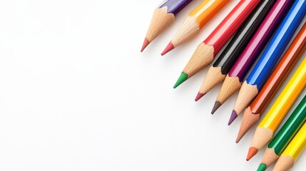 Fototapeta premium Close-up of Vibrant Colored Pencils Arranged on a Clean White Surface