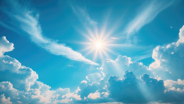 Sunny summer day featuring a blue sky, white clouds, and radiant sun reflection