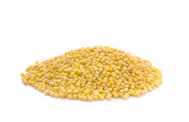 Heap of millet isolated on white background.