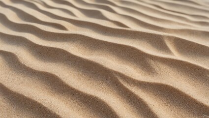 Obraz premium Close-up of sand surface with pattern and sea view, summer travel background