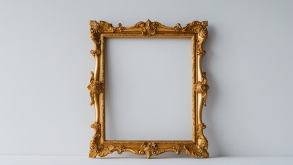 Antique golden frame featuring ornate baroque style against a white backdrop