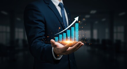 Man in suit holds rising graph representing business growth and success.