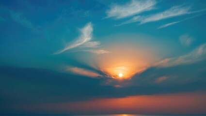 Obraz premium Beautiful sunset scene featuring a calm blue sky with clouds in a scenic landscape