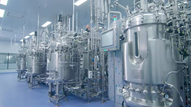 Workshop high-tech stainless steel industrial processing tank control panel for automation, advanced industrial equipment production of pharmaceutical biopharmaceuticals in modern production facility