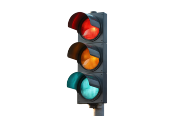 Close-up of a traffic light with red, amber, and green lights against transparent background, concept for transportation, city infrastructure, and road safety.