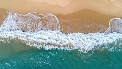 Gardinen Waves crashing on sandy beach coastal region aerial view serene environment nature concept © MDzAiAbstract