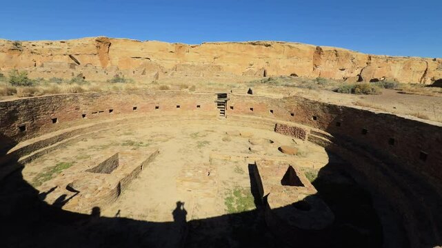 Overhead view of circular kiva ruin with stairways and chambers in deserted Chaco Canyon, New Mexico.