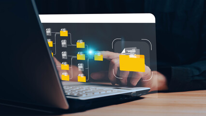 Conceptual image representing a digital data management system, network, or cloud computing service, with holographic documents and a folder displayed above a hand.
