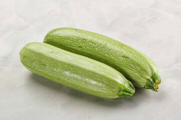 Raw green ripe zucchini vegetable