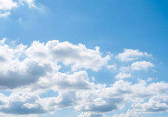 Fototapeta premium Blue Sky with Puffy White Clouds on a Sunny Day