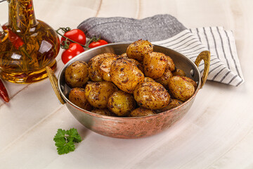 Baked mini potato with herbs