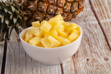 Sweet canned pineapple fruit pieces
