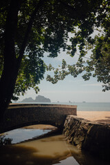 Stone Bridge at Ao Nang Beach Over Shaded Canal, Krabi