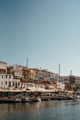 Fototapeta premium Waterfront restaurants and boats in Ciutadella, Menorca