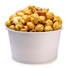 Caramel-coated popcorn with nuts, almonds, and cashew nuts in papper bucket Isolate on white background with clipping path.