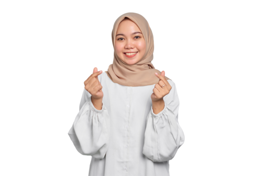 Smiling Asian Muslim woman showing Korean heart with two fingers crossed isolated on transparent background